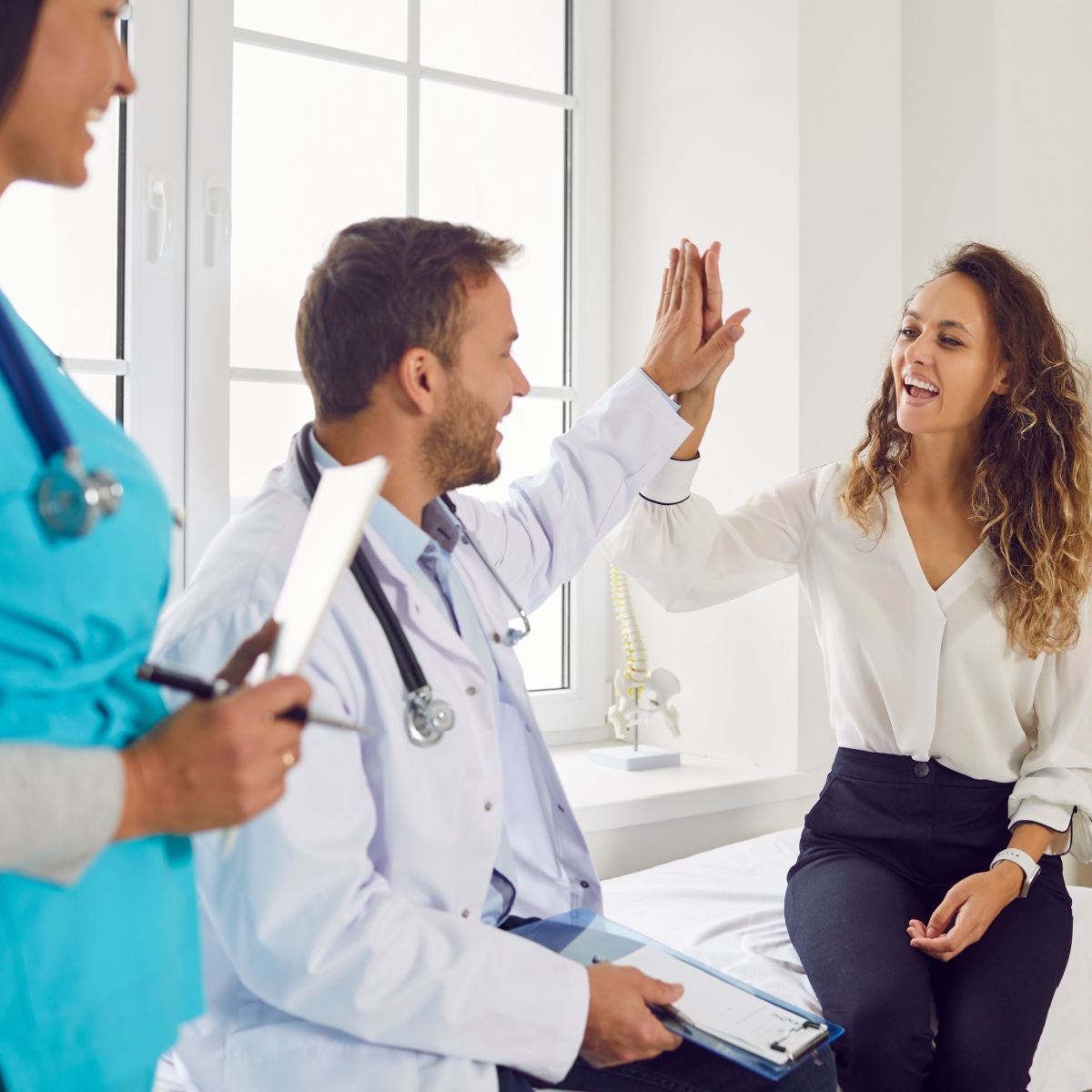 A woman talking to a Kingwood IVF specialist